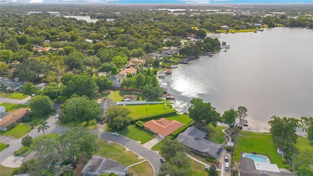 birds eye view of property with a residential view and a water view
