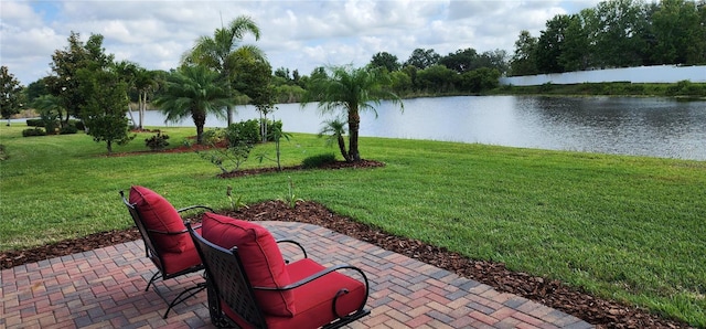 exterior space with a water view