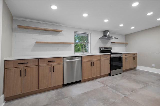 kitchen with open shelves, a sink, light countertops, stainless steel appliances, and wall chimney exhaust hood