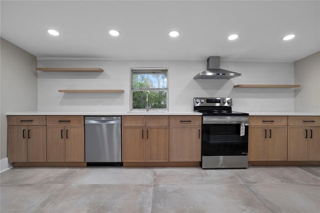 kitchen featuring open shelves, light countertops, wall chimney exhaust hood, a sink, and appliances with stainless steel finishes