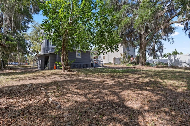 view of yard featuring fence