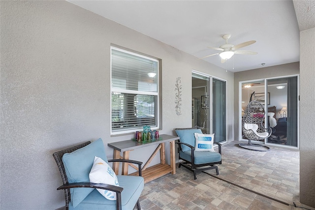 view of patio / terrace with a ceiling fan