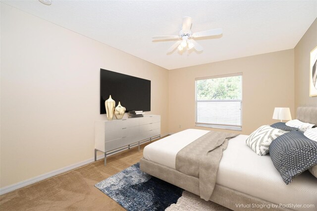 2924 Jebidiah Loop, Saint Cloud, FL 34772 - carpeted bedroom with baseboards and a ceiling fan