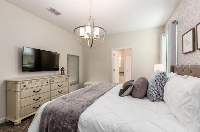 carpeted bedroom with wallpapered walls, baseboards, ensuite bathroom, an inviting chandelier, and visible vents