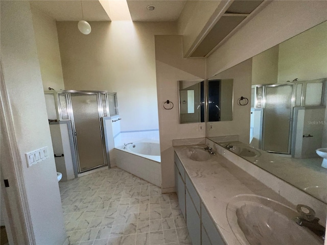 6042 Wade St, Leesburg, FL 34748 - full bathroom featuring double vanity, a garden tub, a shower stall, and a sink