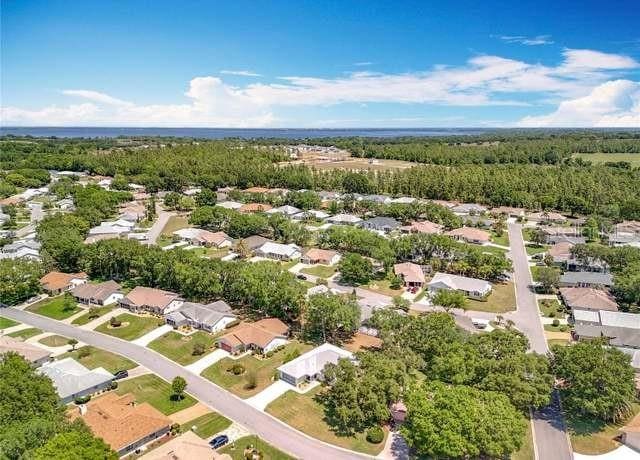 6042 Wade St, Leesburg, FL 34748 - bird's eye view with a residential view
