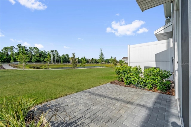 view of patio / terrace with a water view