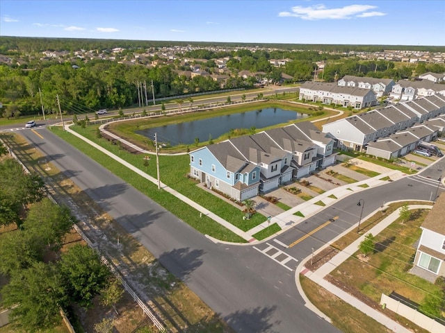 aerial view featuring a residential view and a water view