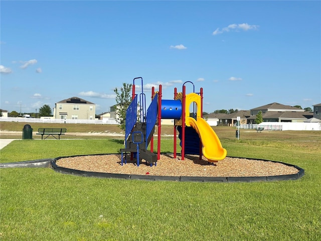 2000 Golden Beak Dr, Eagle Lake, FL 33839 - communal playground featuring a lawn