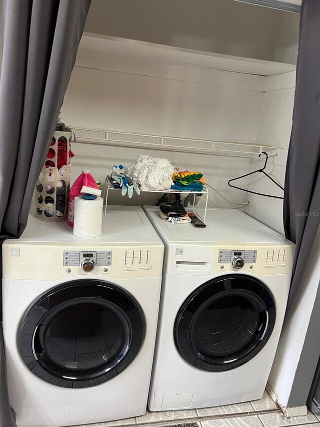 68 S Marbrisa Way, Kissimmee, FL 34743 - washroom featuring laundry area and washer and dryer