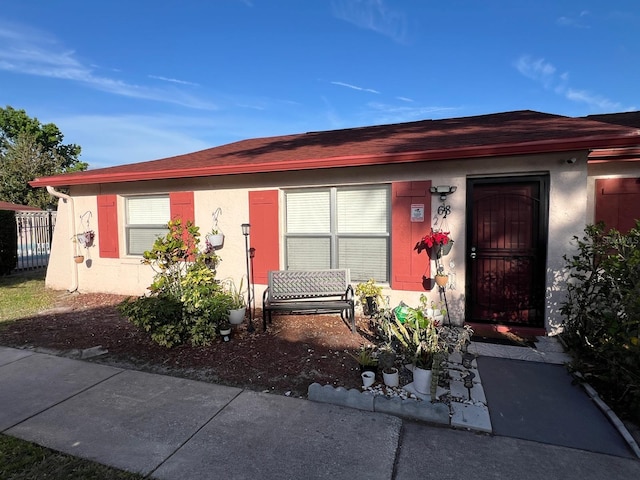 68 S Marbrisa Way, Kissimmee, FL 34743 - view of front facade with stucco siding