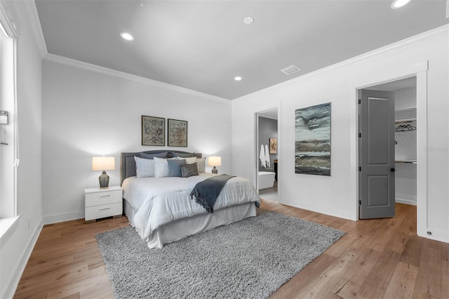 bedroom with crown molding, recessed lighting, visible vents, and light wood-style flooring