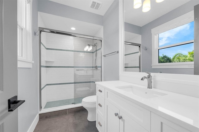 full bathroom with recessed lighting, toilet, vanity, visible vents, and a stall shower