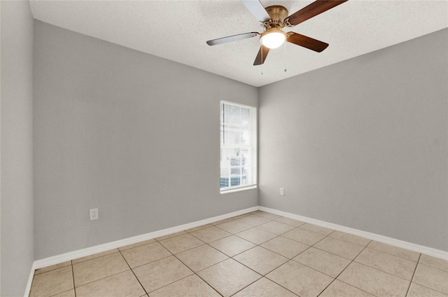 4347 Creekside Blvd, Kissimmee, FL 34746 - unfurnished room with light tile patterned floors, ceiling fan, and baseboards