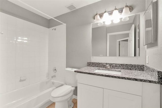 4347 Creekside Blvd, Kissimmee, FL 34746 - bathroom featuring toilet, vanity, and shower / washtub combination