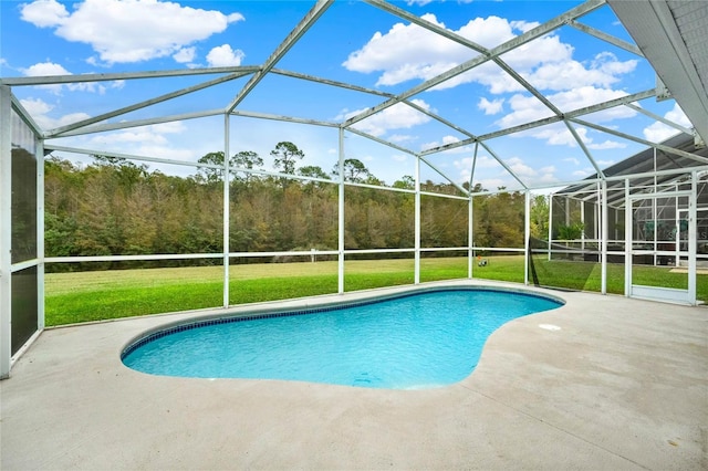 4347 Creekside Blvd, Kissimmee, FL 34746 - outdoor pool featuring a patio, a lawn, and glass enclosure