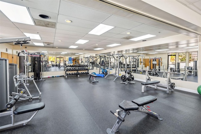 workout area with a drop ceiling