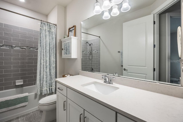 full bathroom with vanity, shower / bath combo with shower curtain, toilet, and wood finished floors
