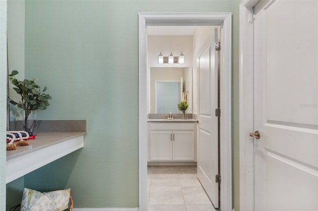 bathroom featuring tile patterned floors and vanity