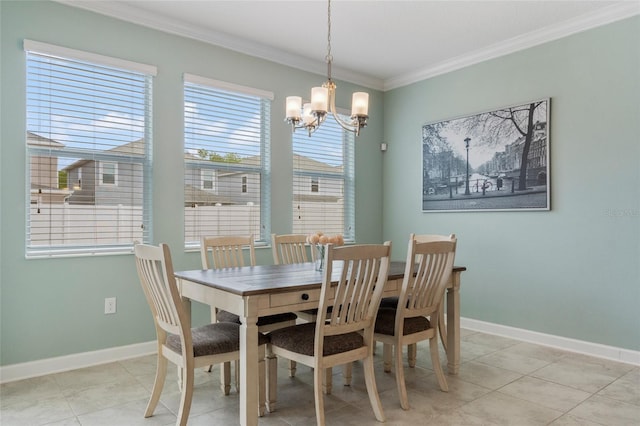 dining space featuring crown molding, a notable chandelier, light tile patterned floors, and baseboards