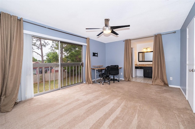 office area with ceiling fan, carpet floors, and baseboards