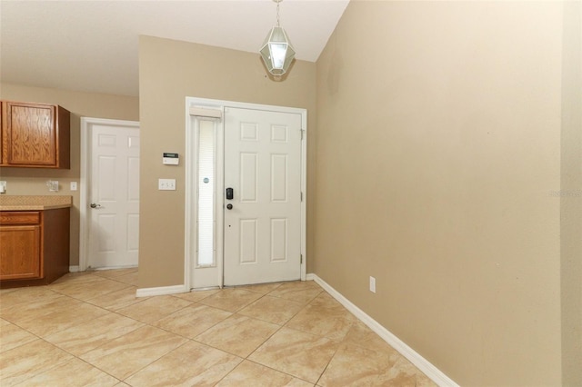 212 Regency St, Davenport, FL 33896 - foyer featuring light tile patterned floors and baseboards