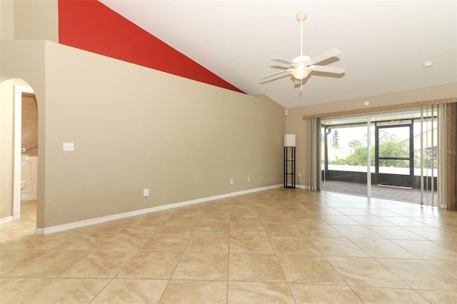 212 Regency St, Davenport, FL 33896 - unfurnished room featuring arched walkways, ceiling fan, light tile patterned floors, and high vaulted ceiling
