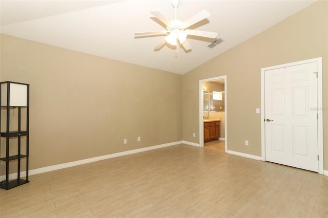 212 Regency St, Davenport, FL 33896 - spare room featuring a ceiling fan, visible vents, light wood-type flooring, baseboards, and lofted ceiling
