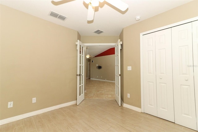 212 Regency St, Davenport, FL 33896 - unfurnished bedroom with visible vents, baseboards, a closet, and french doors