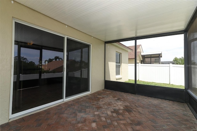 212 Regency St, Davenport, FL 33896 - unfurnished sunroom with plenty of natural light
