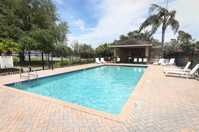212 Regency St, Davenport, FL 33896 - pool featuring fence and a patio area