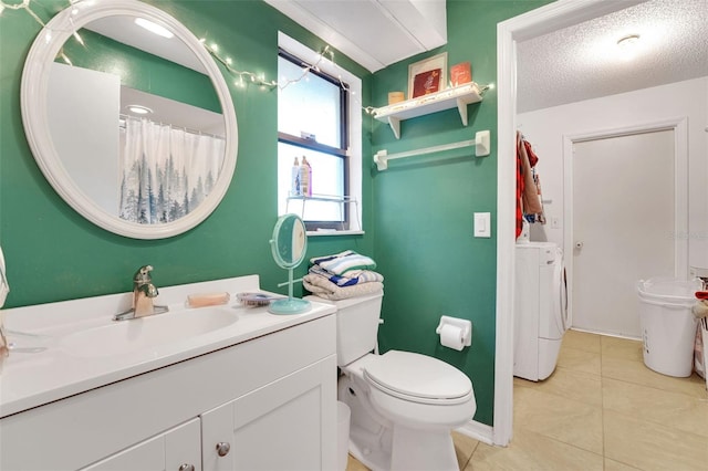 516 Fort Smith Blvd, Deltona, FL 32738 - full bathroom with separate washer and dryer, vanity, tile patterned floors, and a textured ceiling