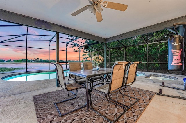 516 Fort Smith Blvd, Deltona, FL 32738 - view of patio / terrace with an in-ground hot tub, an outdoor pool, ceiling fan, and glass enclosure