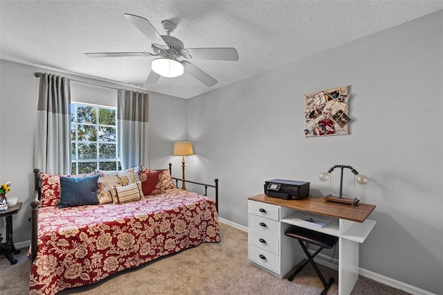 4027 Lakeside Reserve Ct, Orlando, FL 32810 - bedroom featuring light colored carpet, a textured ceiling, baseboards, and a ceiling fan