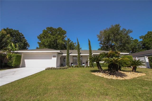 1529 Glastonberry Rd, Maitland, FL 32751 - ranch-style home with an attached garage, driveway, a front yard, and stucco siding