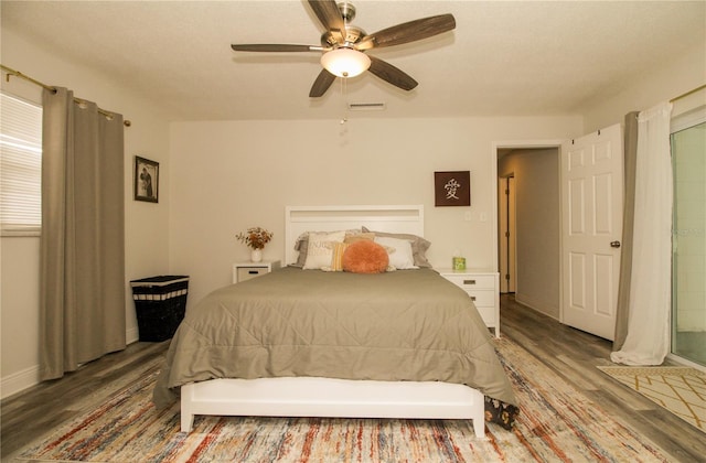 1529 Glastonberry Rd, Maitland, FL 32751 - bedroom with wood finished floors, ceiling fan, and baseboards