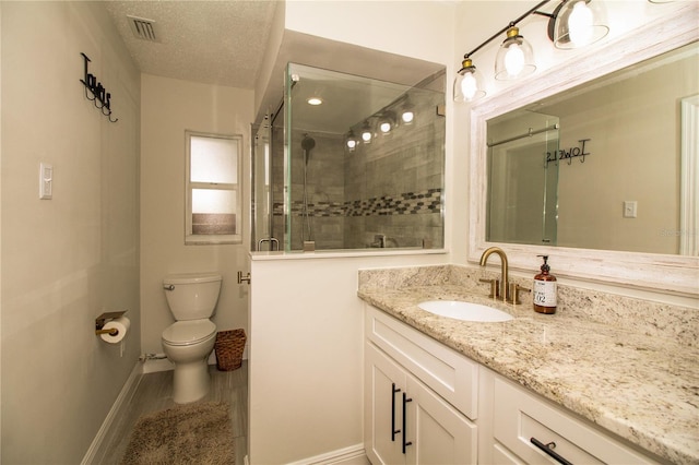 1529 Glastonberry Rd, Maitland, FL 32751 - bathroom with a stall shower, toilet, baseboards, and vanity