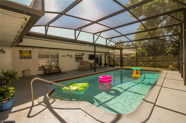 1529 Glastonberry Rd, Maitland, FL 32751 - view of swimming pool with a patio, fence, and glass enclosure
