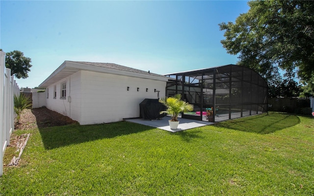 1529 Glastonberry Rd, Maitland, FL 32751 - rear view of house with a patio area and glass enclosure