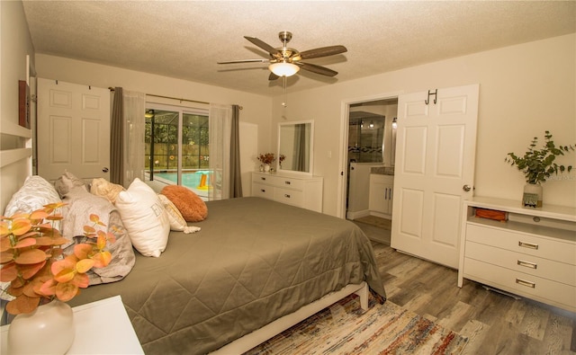 1529 Glastonberry Rd, Maitland, FL 32751 - bedroom with access to exterior, wood finished floors, a textured ceiling, ensuite bathroom, and a ceiling fan