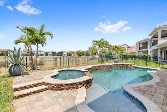 view of swimming pool featuring a residential view and a fenced backyard