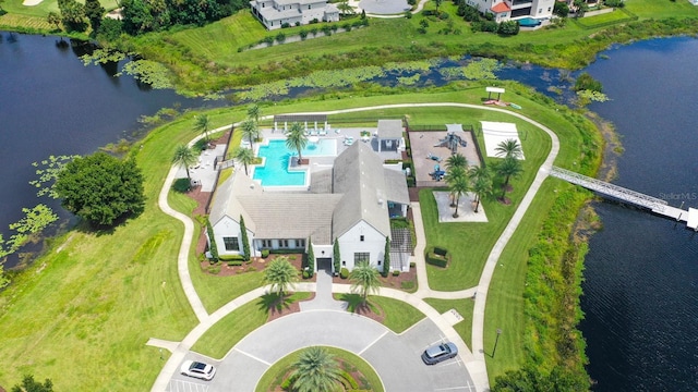 birds eye view of property featuring a water view