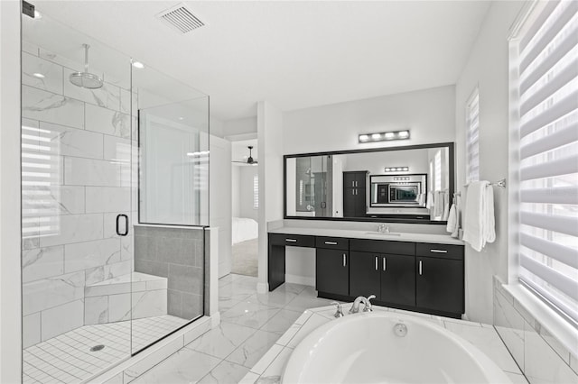 bathroom with vanity, visible vents, marble finish floor, a bath, and a stall shower