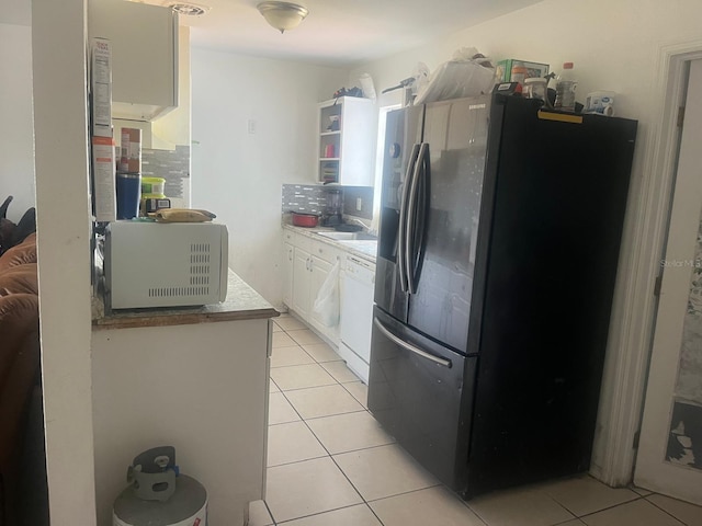 kitchen with white cabinets, open shelves, white appliances, light countertops, and light tile patterned floors