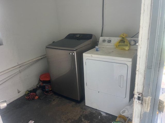 laundry room with independent washer and dryer and laundry area