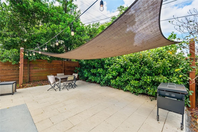 view of patio / terrace with fence and outdoor dining area