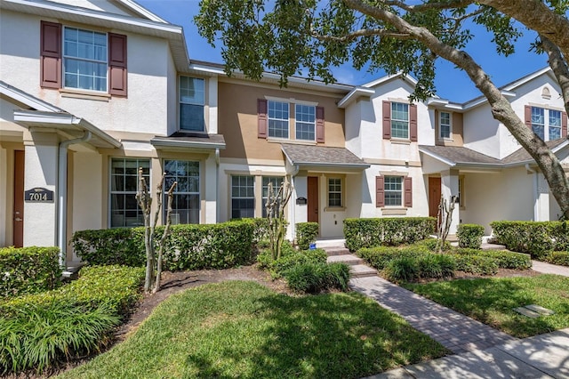 multi unit property featuring stucco siding