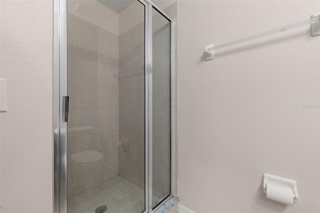 bathroom with a stall shower