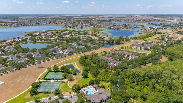 birds eye view of property featuring a residential view and a water view