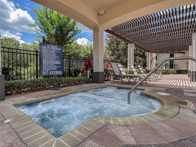 view of pool featuring a patio, fence, a community hot tub, and a pergola